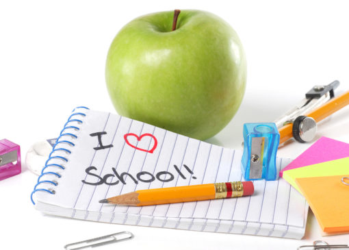 School supplies with apple and message "I Love School"